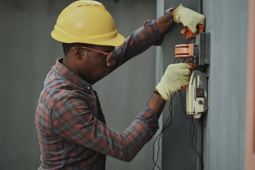 image of an electrician working