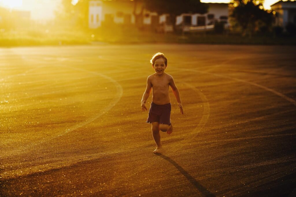 image of a child running outside