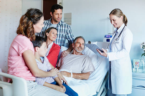 Image of a family visiting a relative in the hospital in the UK