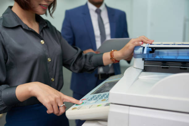 image of someone photocopying a document