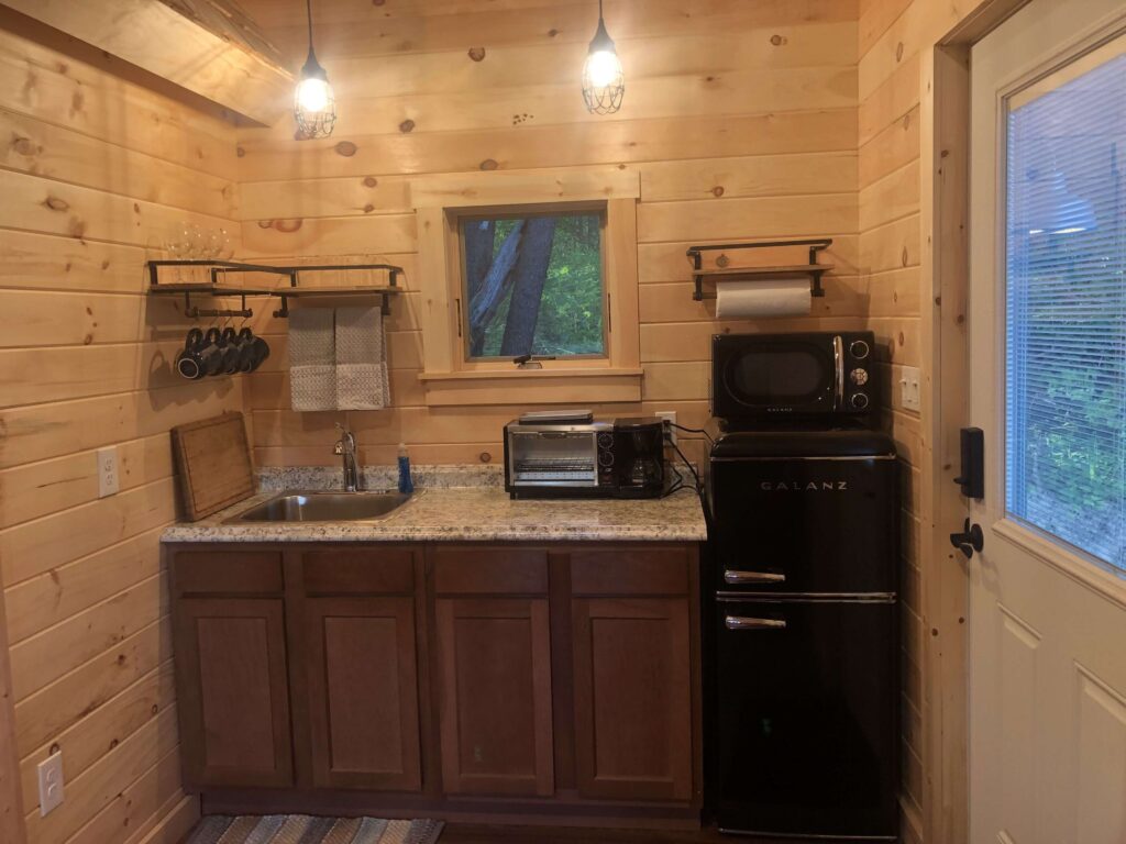 Image of the kitchen area of the Cabin In The Pines Eastside Lake George
