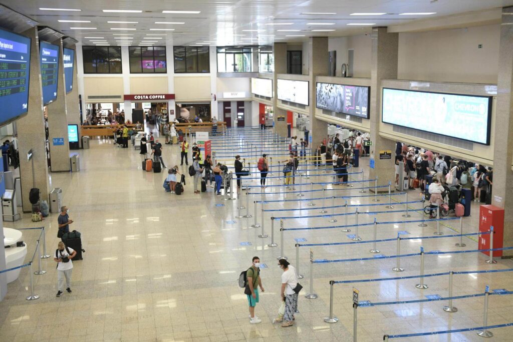 Image of people moving to malta. arriving malta international airport