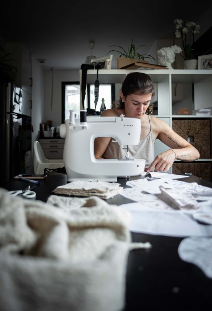 Image of a fashion designer working. A job that is eligible for a global talent visa UK