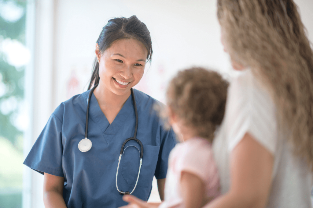 Image of a doctor looking after her patient