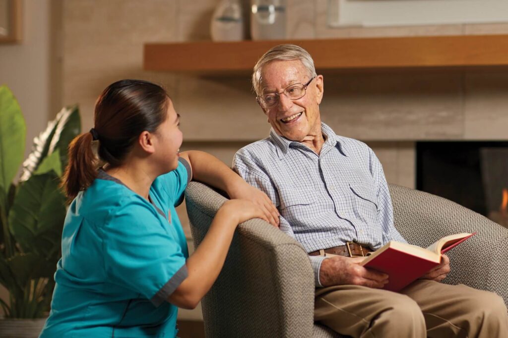 Image of a healthcare assistant working with a client