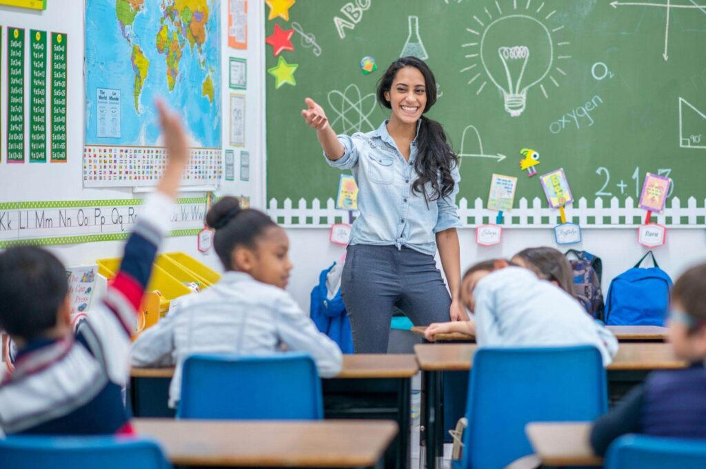 Image of a school teacher teaching a class