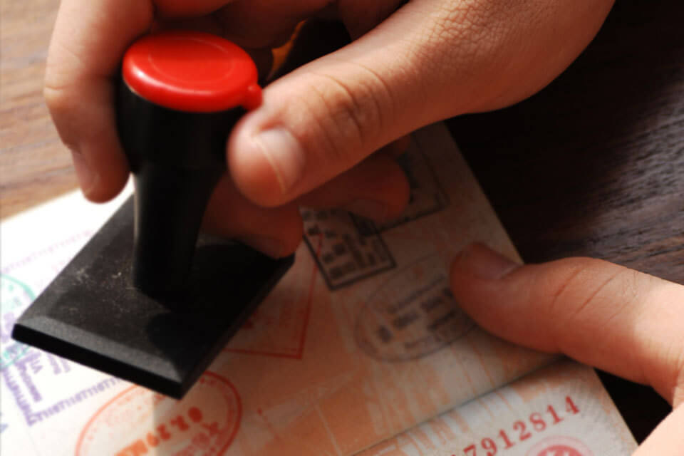 Image of a UK visa being stamped