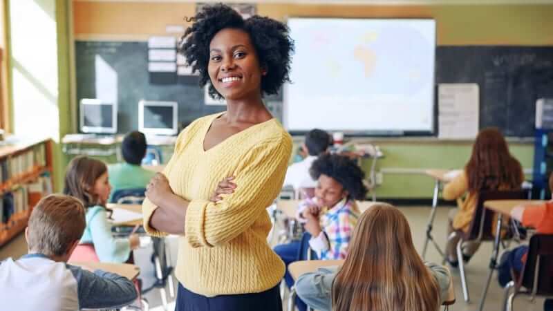 Image of a certified school teacher who got accepted in the UK after passing the teacher interview questions 