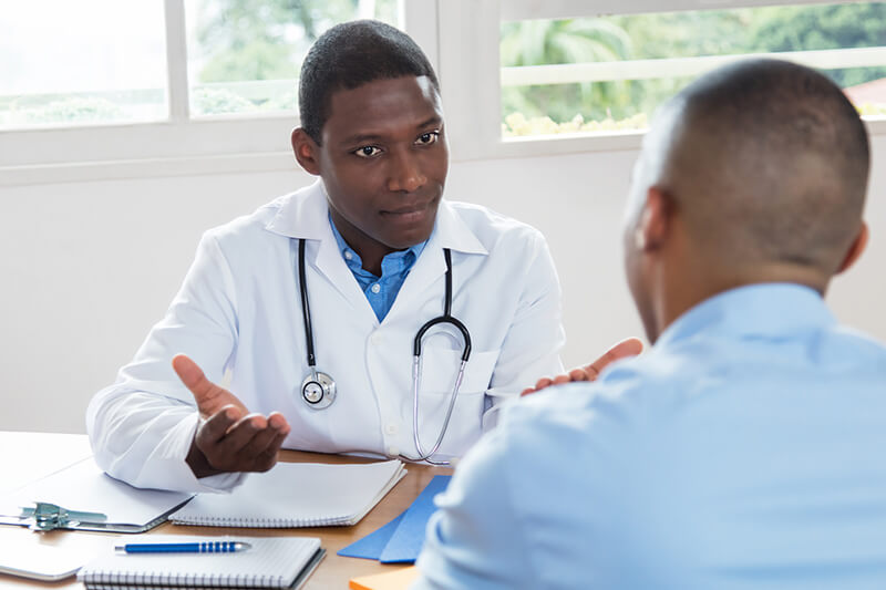 Image of a medical consultant counseling a patient