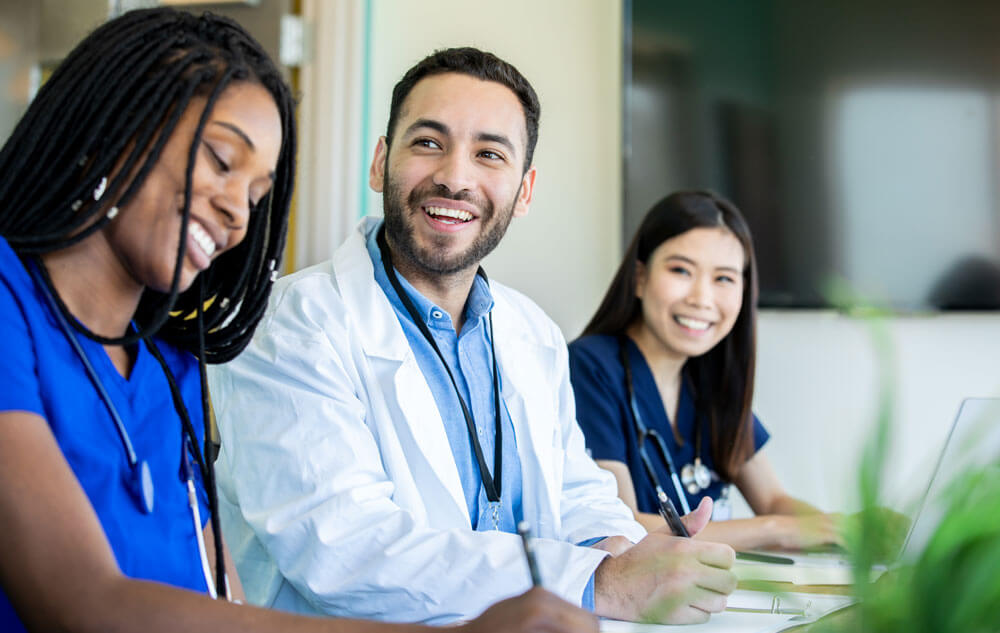 Image of personal assistants working in a hospital