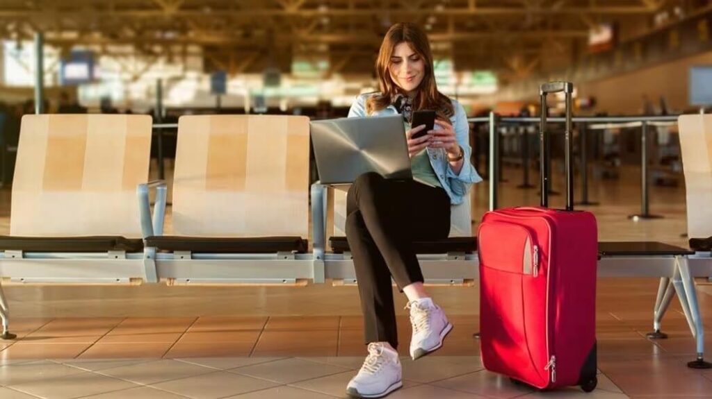 Image of an entrepreneur doing her taxes at the airport