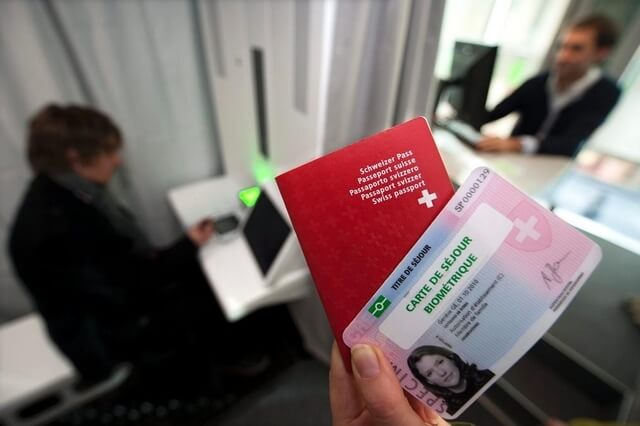 Image of an individual applying for a permit after moving to Switzerland