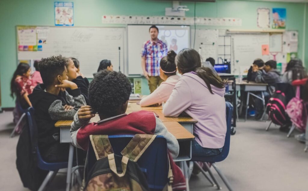 Students studying in the UK while being arranged in groups