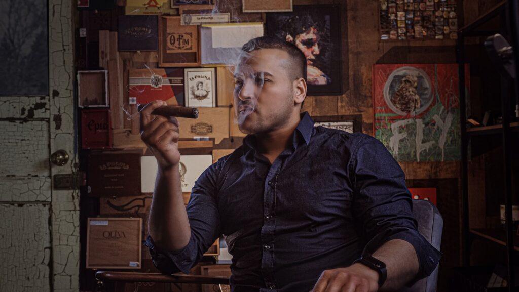 A black man smoking a Cuban cigar in Cuba