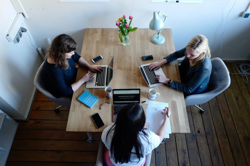 Employees of Intesa Sanpaolo working in their branch of the bank