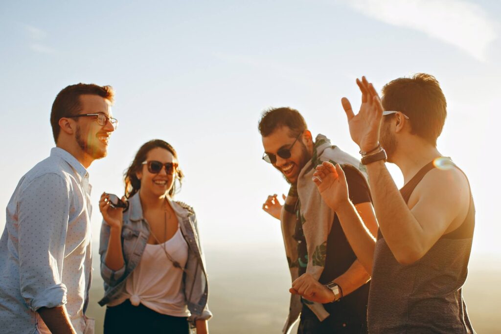 4 travel agents hanging out and having a good time