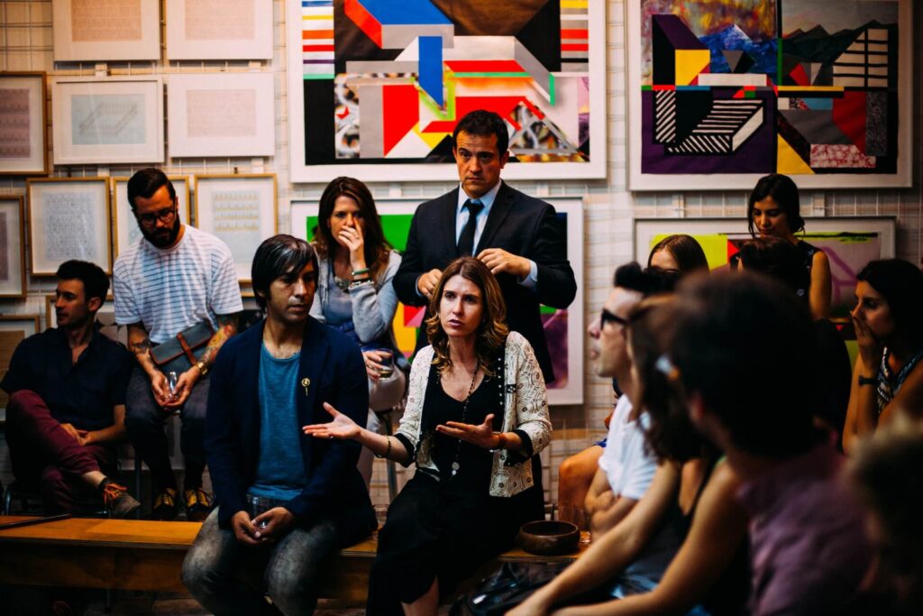 Employees of a travel agency meeting to discuss ways of being more productive