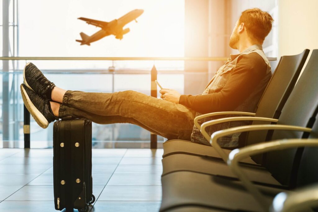 A man waiting for his flight in the airport